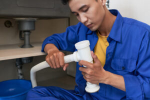 How Hiring a Plumber in Desert Hot Springs Prevents Mineral Buildup Damage